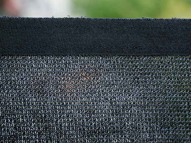 Reinforced Edge With Black Ribbon & Grommets