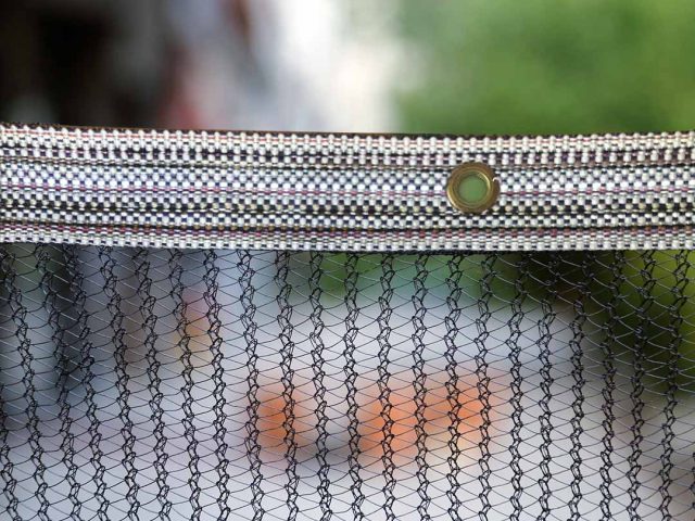 Reinforced Edge With Carpet Ribbon & Grommets