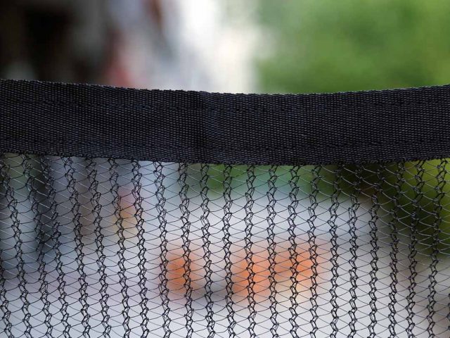 Reinforced Edge With Black Ribbon & Grommets